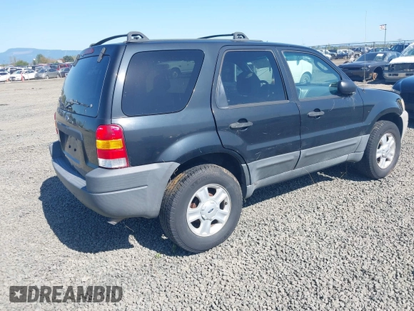 2003 Ford Escape XLT Popular 2 with VIN 1FMYU93113KC18744, listed as a IAAI auction lot 42027721 with 234,338 mi miles and . Bid and sale history available at DreamBid. Image 4.