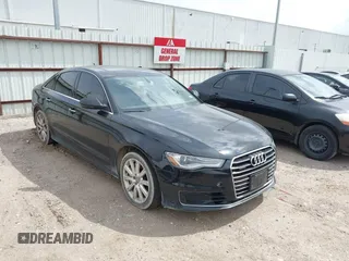 2016 Audi A6 2.0T Premium Plus with VIN WAUGFAFC1GN012799, listed as a IAAI auction lot 42141346 with 101,506 mi miles. Bid and sale history available at carsss.com. Image 1.