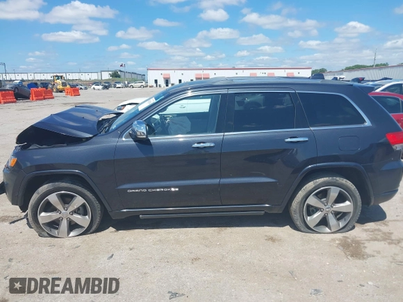 2015 Jeep Grand Cherokee High Altitude with VIN 1C4RJFCG5FC807394, listed as a IAAI auction lot 42452034 with 72,011 mi miles and . Bid and sale history available at DreamBid. Image 15.