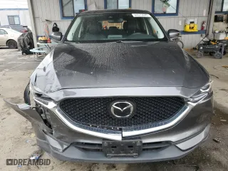 2020 Mazda CX-5 Touring with VIN JM3KFACM6L0797748, listed as a Copart auction lot 44573645 with 104,094 mi miles and Salvage Title. Bid and sale history available at carsss.com. Image 5.