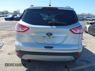 2014 Ford Escape SE with VIN 1FMCU0GX6EUE34729, listed as a IAAI auction lot 41879689 with 167,600 mi miles and . Bid and sale history available at DreamBid. Image 16.