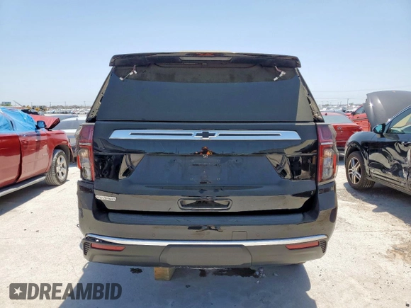 2023 Chevrolet Tahoe Commercial with VIN 1GNSCLEDXPR447042, listed as a Copart auction lot 52399275 with 22,205 mi miles and Salvage title. Bid and sale history available at DreamBid. Image 6.
