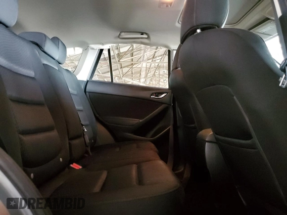2014 Mazda CX-5 Touring z VIN JM3KE2CY7E0349484, wystawiony jako Copart lot #51188665 z przebiegiem 175 131 mil mil oraz Szkoda całkowita • Salvage title. Historia ofert i sprzedaży dostępna na DreamBid. Obrazek 10.