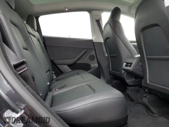 2025 Tesla Model Y Long Range with VIN 7SAYGDED4SF242721, listed as a Copart auction lot 56159955 with 7,131 mi miles and Salvage Title. Bid and sale history available at DreamBid. Image 11.