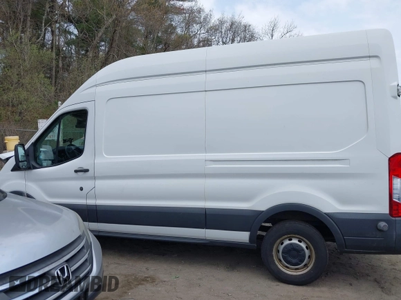 2016 Ford Transit with VIN 1FTYR2XM3GKB21990, listed as a IAAI auction lot 42091685 with 106,235 mi miles and . Bid and sale history available at DreamBid. Image 14.