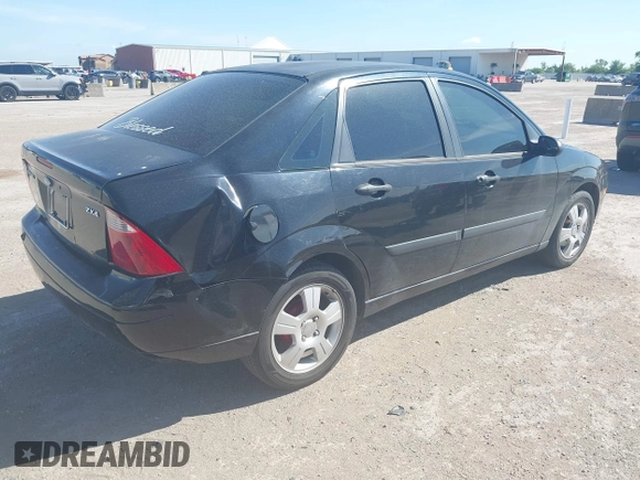 2005 Ford Focus S с VIN 1FAFP34N45W101548, выставлен на аукционе IAAI как лот 42607412 с пробегом 180 785 миль миль и . История ставок и продаж доступна на DreamBid. Изображение 4.