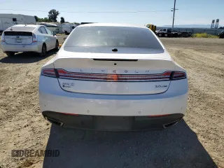 2016 Lincoln MKZ z VIN 3LN6L2G90GR600752, wystawiony jako Copart lot #56599625 z przebiegiem 73 275 mil mil oraz Szkoda całkowita • Salvage title. Historia ofert i sprzedaży dostępna na DreamBid. Obrazek 6.