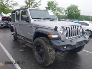 2018 Jeep Wrangler Unlimited Sport S with VIN 1C4HJXDN1JW145240, listed as a IAAI auction lot 42225470 with 31,398 mi miles and . Bid and sale history available at DreamBid. Image 1.