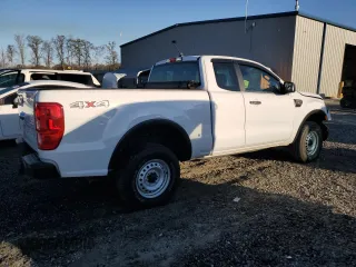 2020 Ford Ranger XL with VIN 1FTER1FH4LLA44004, listed as a Copart auction lot 50597155 with 59,173 mi miles and Salvage Title. Bid and sale history available at carsss.com. Image 3.