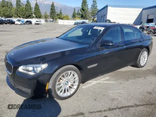2014 BMW 7 Series 750i с VIN WBAYA8C5XED228235, выставлен на аукционе Copart как лот 85604144 с пробегом Не указан миль и Списание • Salvage title. История ставок и продаж доступна на DreamBid. Изображение 1.
