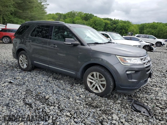 2018 Ford Explorer XLT with VIN 1FM5K8D80JGA94660, listed as a Copart auction lot 59012215 with 105,331 mi miles and Salvage title. Bid and sale history available at DreamBid. Image 4.
