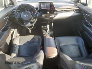 2019 Toyota C-HR XLE z VIN JTNKHMBX7K1014151, wystawiony jako Copart lot #50699475 z przebiegiem 102 995 mil mil oraz Czysty tytuł • Clean title. Historia ofert i sprzedaży dostępna na DreamBid. Obrazek 8.