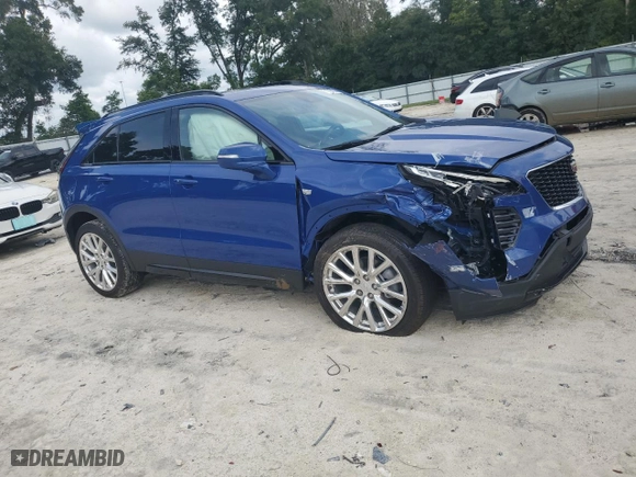 2023 Cadillac XT4 FWD Sport with VIN 1GYFZER43PF111131, listed as a Copart auction lot 71765404 with 524 mi miles and Salvage Title. Bid and sale history available at carsss.com. Image 4.