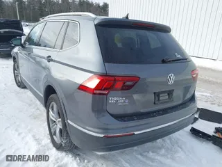 2020 Volkswagen Tiguan SE with VIN 3VV2B7AXXLM093989, listed as a IAAI auction lot 41599430 with 28,801 mi miles. Bid and sale history available at carsss.com. Image 3.