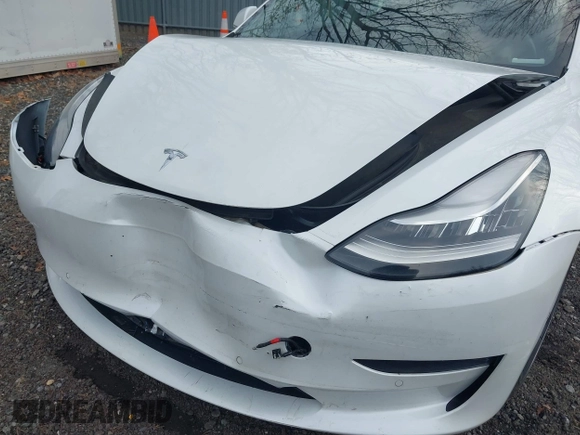 2020 Tesla Model 3 Long Range with VIN 5YJ3E1EB6LF618931, listed as a IAAI auction lot 41867451 with 47,502 mi miles and . Bid and sale history available at DreamBid. Image 6.