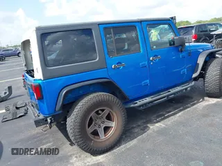 2015 Jeep Wrangler Unlimited Sport with VIN 1C4BJWDG1FL716400, listed as a IAAI auction lot 42645745 with 83,199 mi miles and . Bid and sale history available at DreamBid. Image 4.