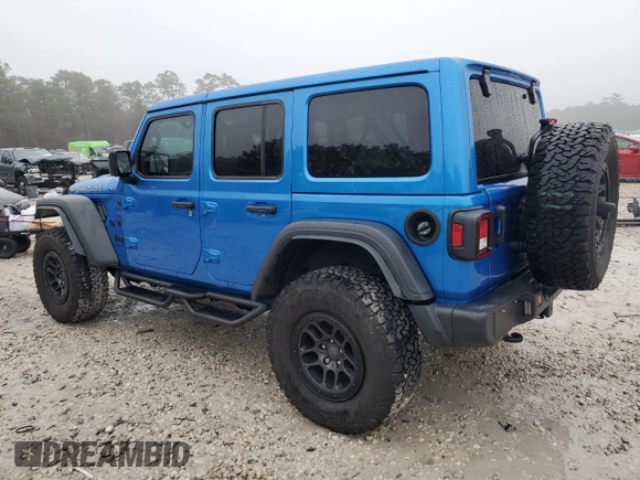 2023 Jeep Wrangler Sport S with VIN 1C4HJXDGXPW692324, listed as a Copart auction lot 41761235 with 15,660 mi miles and Salvage Title. Bid and sale history available at DreamBid. Image 2.