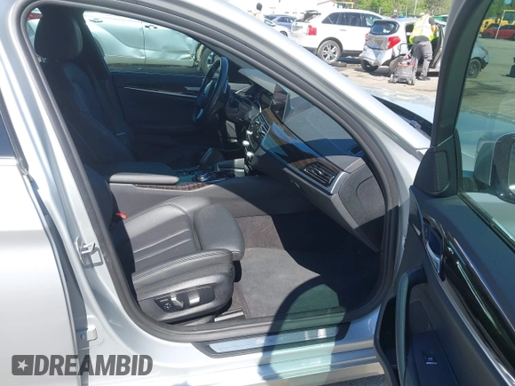 2019 BMW 5 Series 530i with VIN WBAJA5C5XKWW07106, listed as a IAAI auction lot 41977982 with 65,371 mi miles and . Bid and sale history available at carsss.com. Image 5.