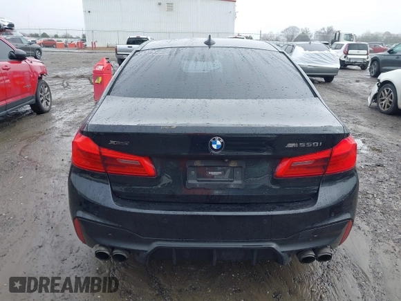2018 BMW 5 Series M550i xDrive with VIN WBAJB9C59JB049114, listed as a IAAI auction lot 41543633 with 87,942 mi miles and . Bid and sale history available at carsss.com. Image 17.