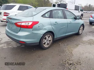2012 Ford Focus SEL with VIN 1FAHP3H29CL430964, listed as a IAAI auction lot 42186057 with 122,279 mi miles. Bid and sale history available at carsss.com. Image 4.