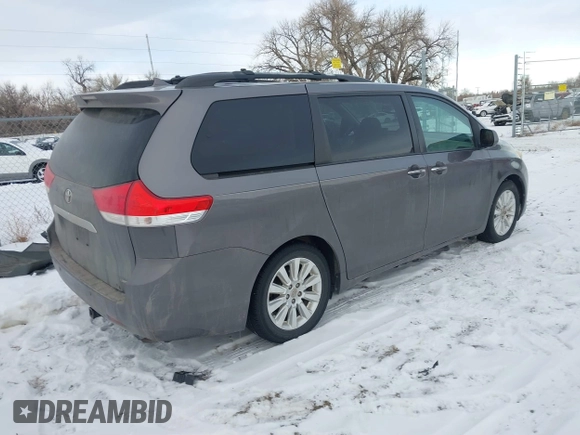 2011 Toyota Sienna XLE AAS with VIN 5TDYK3DC5BS138281, listed as a IAAI auction lot 41381494 with 194,635 mi miles and . Bid and sale history available at DreamBid. Image 4.
