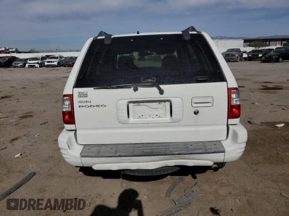 2000 Isuzu Rodeo S z VIN 4S2CK58W2Y4317915, wystawiony jako Copart lot #81780094 z przebiegiem 158 217 mil mil oraz Szkoda całkowita • Salvage title. Historia ofert i sprzedaży dostępna na DreamBid. Obrazek 6.