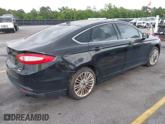 2014 Ford Fusion SE with VIN 3FA6P0HD5ER182028, listed as a IAAI auction lot 42108063 with 198,131 mi miles and . Bid and sale history available at DreamBid. Image 4.