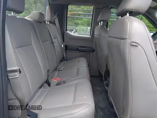 2018 Ford F-150 XL with VIN 1FTEX1CB5JFE55932, listed as a IAAI auction lot 42298917 with 143,923 mi miles and . Bid and sale history available at DreamBid. Image 8.
