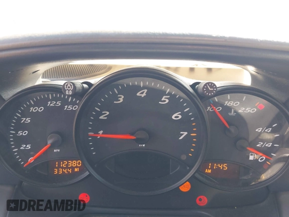 1999 Porsche Boxster z VIN WP0CA2989XU627152, wystawiony jako IAAI lot #41805432 z przebiegiem 112 380 mil mil oraz . Historia ofert i sprzedaży dostępna na DreamBid. Obrazek 7.