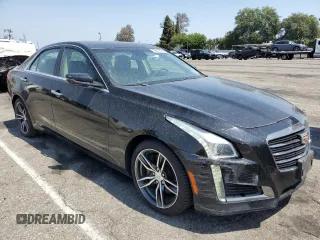 2019 Cadillac CTS Luxury RWD with VIN 1G6AR5SX1K0147998, listed as a Copart auction lot 59641595 with 37,636 mi miles and Clean title. Bid and sale history available at DreamBid. Image 4.