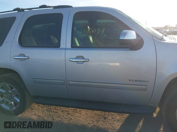 2014 GMC Yukon SLT with VIN 1GKS2CE00ER225071, listed as a IAAI auction lot 41581341 with 113,212 mi miles. Bid and sale history available at carsss.com. Image 14.