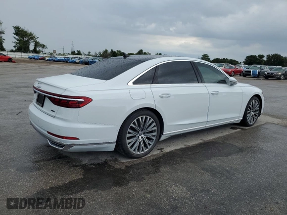 2019 Audi A8 z VIN WAU8DAF88KN004066, wystawiony jako Copart lot #56928395 z przebiegiem 93 157 mil mil oraz Czysty tytuł • Clean title. Historia ofert i sprzedaży dostępna na DreamBid. Obrazek 3.