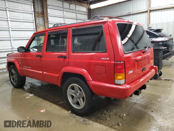2001 Jeep Cherokee Sport with VIN 1J4FF58S01L519670, listed as a Copart auction lot 84340454 with 132,584 mi miles and Clean title. Bid and sale history available at DreamBid. Image 2.