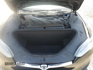 2019 Tesla Model S 100D with VIN 5YJSA1E42KF331240, listed as a Copart auction lot 54713975 with 43,940 mi miles and Salvage title. Bid and sale history available at DreamBid. Image 12.