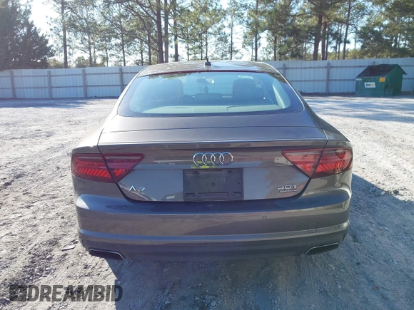 2016 Audi A7 3.0 Premium Plus with VIN WAUWGAFC2GN105498, listed as a IAAI auction lot 41488062 with 120,393 mi miles. Bid and sale history available at carsss.com. Image 16.