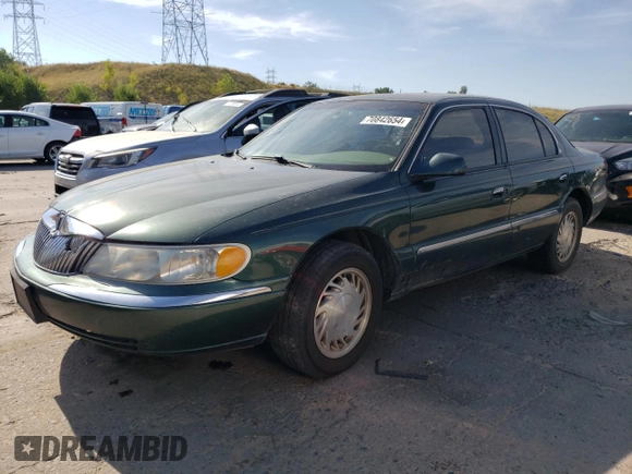 1998 Lincoln Continental with VIN 1LNFM97V8WY707809, listed as a Copart auction lot 70842654 with 175,066 mi miles and Salvage Title. Bid and sale history available at carsss.com. Image 1.
