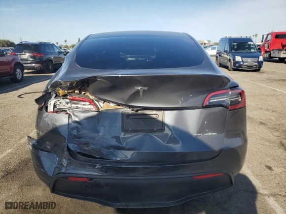 2021 Tesla Model Y Long Range with VIN 5YJYGDEE3MF161542, listed as a Copart auction lot 51129775 with 70,990 mi miles and Salvage Title. Bid and sale history available at carsss.com. Image 6.