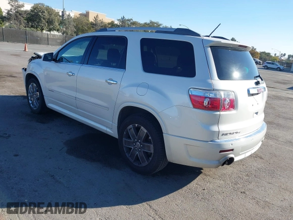 2011 GMC Acadia Denali z VIN 1GKKRTED0BJ334817, wystawiony jako IAAI lot #40957886 z przebiegiem 186 093 mil mil oraz . Historia ofert i sprzedaży dostępna na DreamBid. Obrazek 3.
