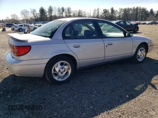 2001 Saturn SL z VIN 1G8ZK54701Z301199, wystawiony jako Copart lot #48488335 z przebiegiem 96 151 mil mil oraz Szkoda całkowita • Salvage title. Historia ofert i sprzedaży dostępna na DreamBid. Obrazek 3.