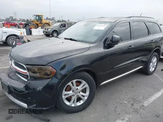 2012 Dodge Durango Crew with VIN 1C4SDHDT0CC321037, listed as a IAAI auction lot 42793232 with 162,593 mi miles and . Bid and sale history available at DreamBid. Image 2.