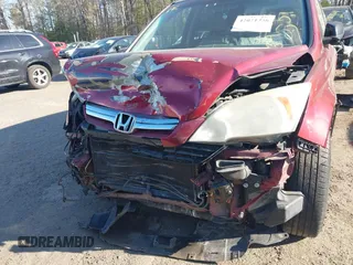 2009 Honda CR-V EX with VIN 5J6RE48549L013467, listed as a IAAI auction lot 42021336 with 187,752 mi miles and . Bid and sale history available at carsss.com. Image 13.