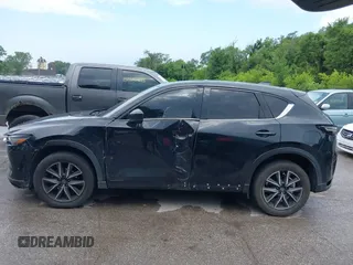 2018 Mazda CX-5 Grand Touring with VIN JM3KFBDM2J0400828, listed as a IAAI auction lot 42540846 with 254,672 mi miles and . Bid and sale history available at DreamBid. Image 14.
