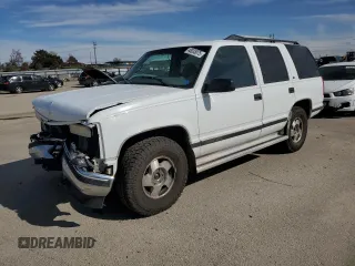 1999 GMC Yukon with VIN 1GKEK13R4XJ751482, listed as a Copart auction lot 48035075 with 154,800 mi miles and Salvage Title. Bid and sale history available at carsss.com. Image 1.