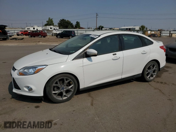 2014 Ford Focus SE with VIN 1FADP3F22EL110454, listed as a Copart auction lot 70076854 with 98,577 mi miles and Salvage Title. Bid and sale history available at carsss.com. Image 1.