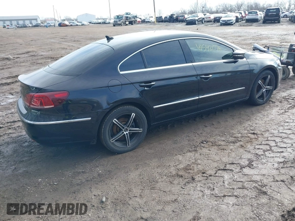 2014 Volkswagen CC Sport with VIN WVWBP7AN4EE534247, listed as a IAAI auction lot 41542076 with 119,199 mi miles and . Bid and sale history available at DreamBid. Image 4.
