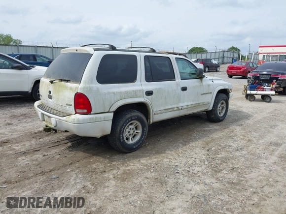 2000 Dodge Durango with VIN 1B4HS28N2YF141487, listed as a IAAI auction lot 42119907 with 244,752 mi miles and . Bid and sale history available at DreamBid. Image 4.