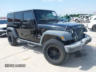 2015 Jeep Wrangler Unlimited Sport z VIN 1C4BJWDG2FL689188, wystawiony jako IAAI lot #42448913 z przebiegiem 100 821 mil mil oraz . Historia ofert i sprzedaży dostępna na DreamBid. Obrazek 1.