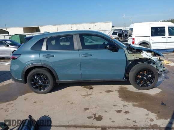 2024 Honda HR-V Sport z VIN 3CZRZ1H54RM754560, wystawiony jako IAAI lot #41652351 z przebiegiem 8 371 mil mil oraz . Historia ofert i sprzedaży dostępna na DreamBid. Obrazek 14.