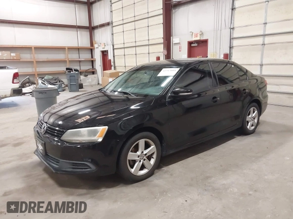 2014 Volkswagen Jetta SE with VIN 3VWD17AJ7EM409189, listed as a IAAI auction lot 42313804 with 139,950 mi miles and . Bid and sale history available at DreamBid. Image 17.