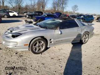2000 Pontiac Firebird Formula z VIN 2G2FV22G1Y2136136, wystawiony jako Copart lot #83538214 z przebiegiem 94 388 mil mil oraz Szkoda całkowita • Salvage title. Historia ofert i sprzedaży dostępna na DreamBid. Obrazek 1.